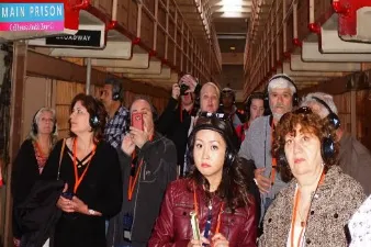 Tourists-visiting-a-cell-block-in-alcatraz-prison-cells