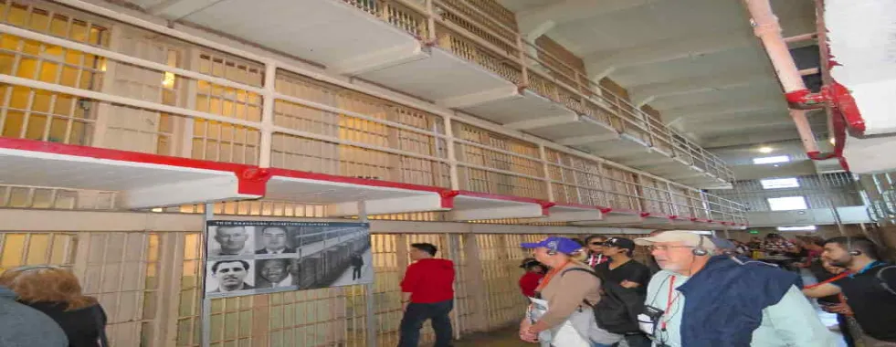 visitors-walking-tour-inside-Alcatraz-Penitentiary-cell-block-min--gallery